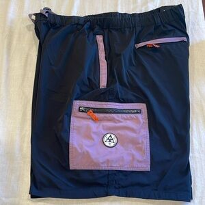 B024009 WELCOME APEX WOVEN NYLON CARGO SHORTS BLACK AND PYRPLE SZ 2XL